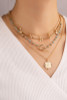 Four layer delicate chain necklace with anchor charms gold tone
