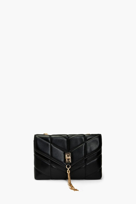 Black quilted crossbody envelope shape gold hardware front tassel detail.