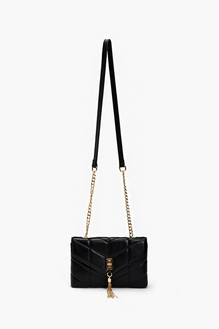 Black quilted crossbody envelope shape gold hardware front tassel detail.