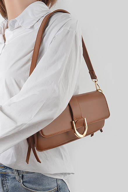 Camel Faux leather sleek rectangle shape shoulder bag 10.25 wide by 3.75 high by 2 inches deep