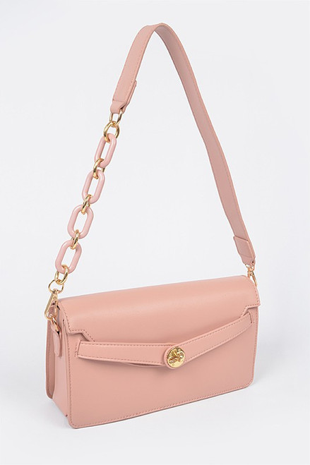 Faux leather Crossbody bag 10 inches wide by 5 inches high by 2.5 deep polyurethane, mixed metal in pink