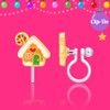 Girl Nation Gingerbread House Clip-On Earrings with colorful enamel design and transparent silicone clip