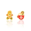 Gingerbread man and hot cocoa stud earrings with candy cane, snowflake and gold-tone details