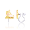 Front and side views of Girl Nation white ice skate clip-on earring showing pink flowers, subtle glitter enamel, detailed laces and transparent silicone clip