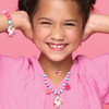 Girl wearing Girl Nation Magical Unicorn bracelet and matching necklace