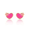 Pair of heart and flower enamel stud earrings with gold-tone trim on white background