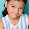 Girl Nation Sweet Petite Crystal Flip Flop Necklace worn on smiling child, gold chain with pink enamel flip flop charm and pearl detail