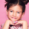 Girl wearing Girl Nation Petal Party flower ring