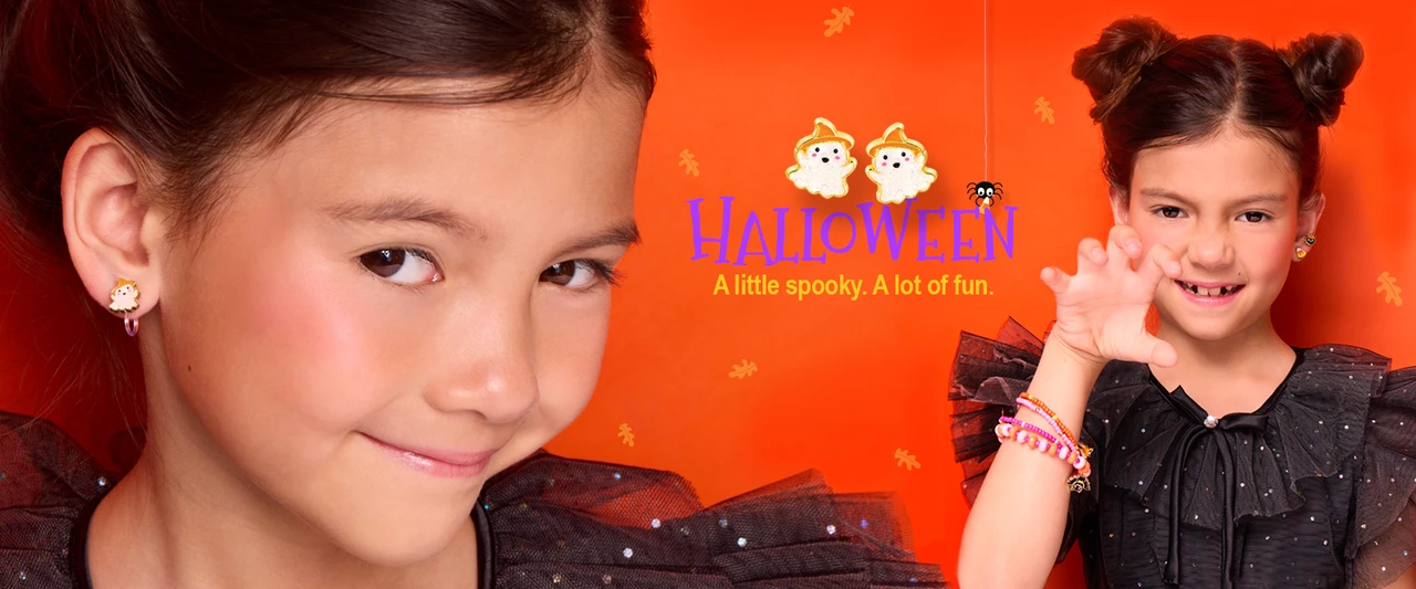 Girls wearing Girl Nation Halloween earrings and bracelets with cute ghost designs