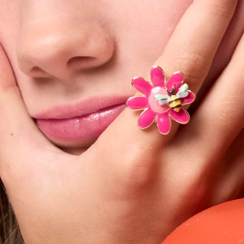 Girl wearing Petal Party flower ring