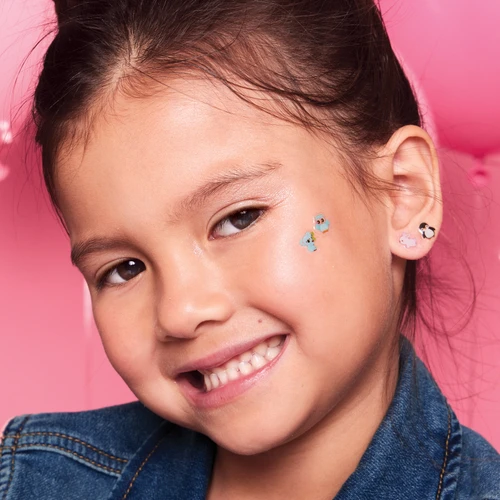 Girl wearing Girl Nation Cutie Stick-On Earrings