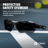 Onix Falcon pickleball eyewear resting on a court line, side view showing the black frame and dark lens
