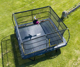 Girl enjoying 12ft x 12ft Telstar ELITE square trampoline