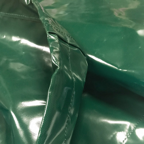 close up of green heavy duty pvc trampoline cover close up of green heavy duty pvc trampoline cover