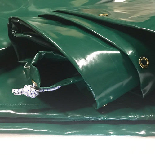 Weather cover showing eyelets and bungee cord Weather cover showing eyelets and bungee cord