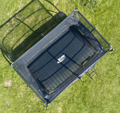 8ft x 12ft Telstar ELITE rectangle trampoline lifestyle shot in garden