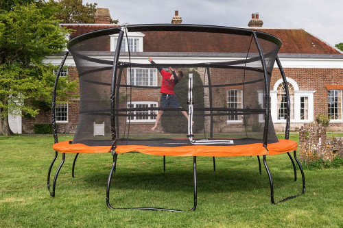 Child bouncing on 14ft Telstar Jump Capsule MK3 in garden
