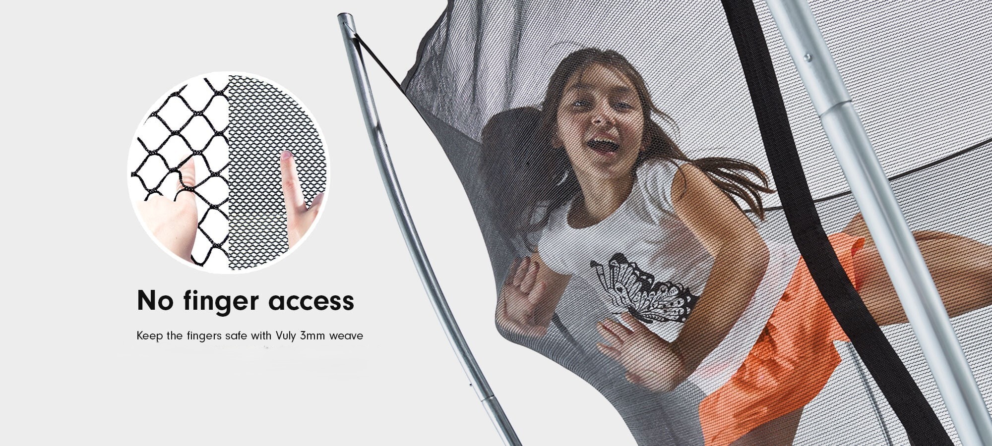 Close-up of a child bouncing safely inside the Vuly Ultra's tight-weave safety netting