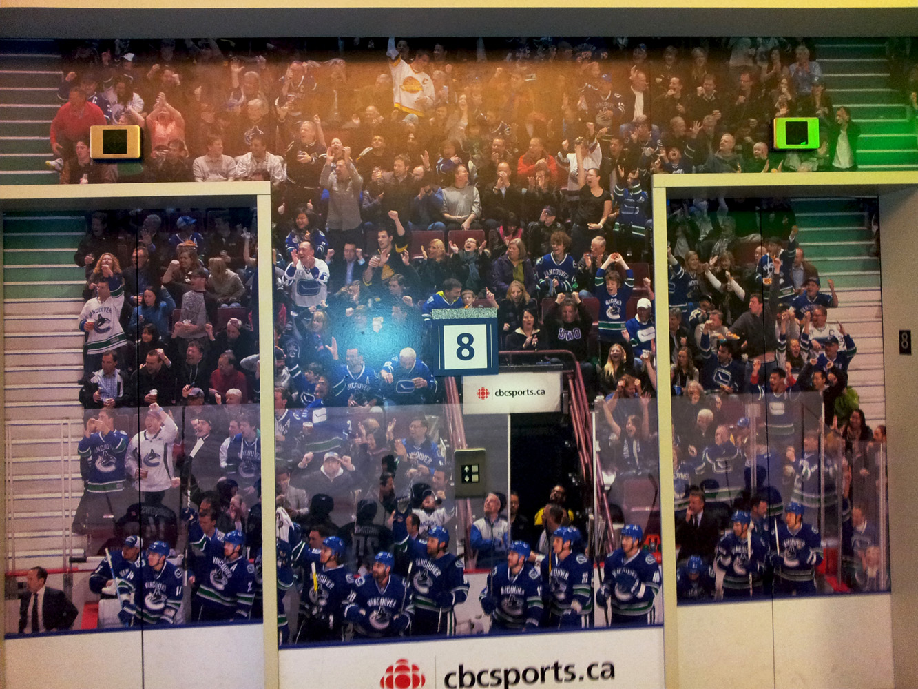 nhl photo mural across elevator doors