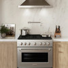ZLINE 4-Piece Appliance Package - 36-inch Gas Range, Tall Tub Dishwasher, Microwave Drawer & Premium Hood (4KP-SGRRH36-MWDWV)