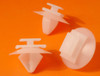White automotive trim and body fastening clip for selected Peugeot, Citroën, Renault, Fiat and Lancia applications.