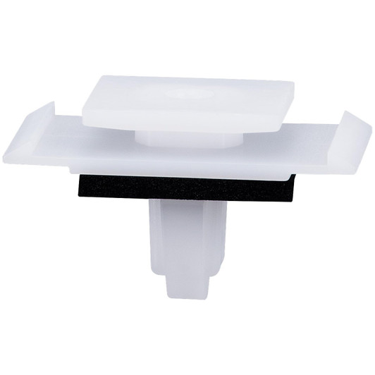 White plastic automotive rocker panel moulding clip with foam sealing pad and push-in stem, rectangular top with side locating tabs.