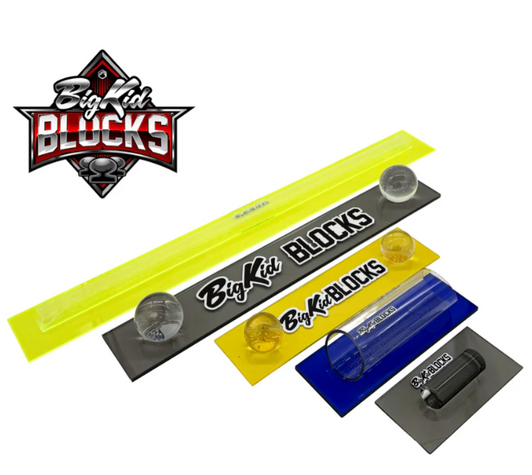 Big Kid Blocks Initiation Kit with multiple coloured sanding blocks and the Big Kid Blocks logo on a white background.
