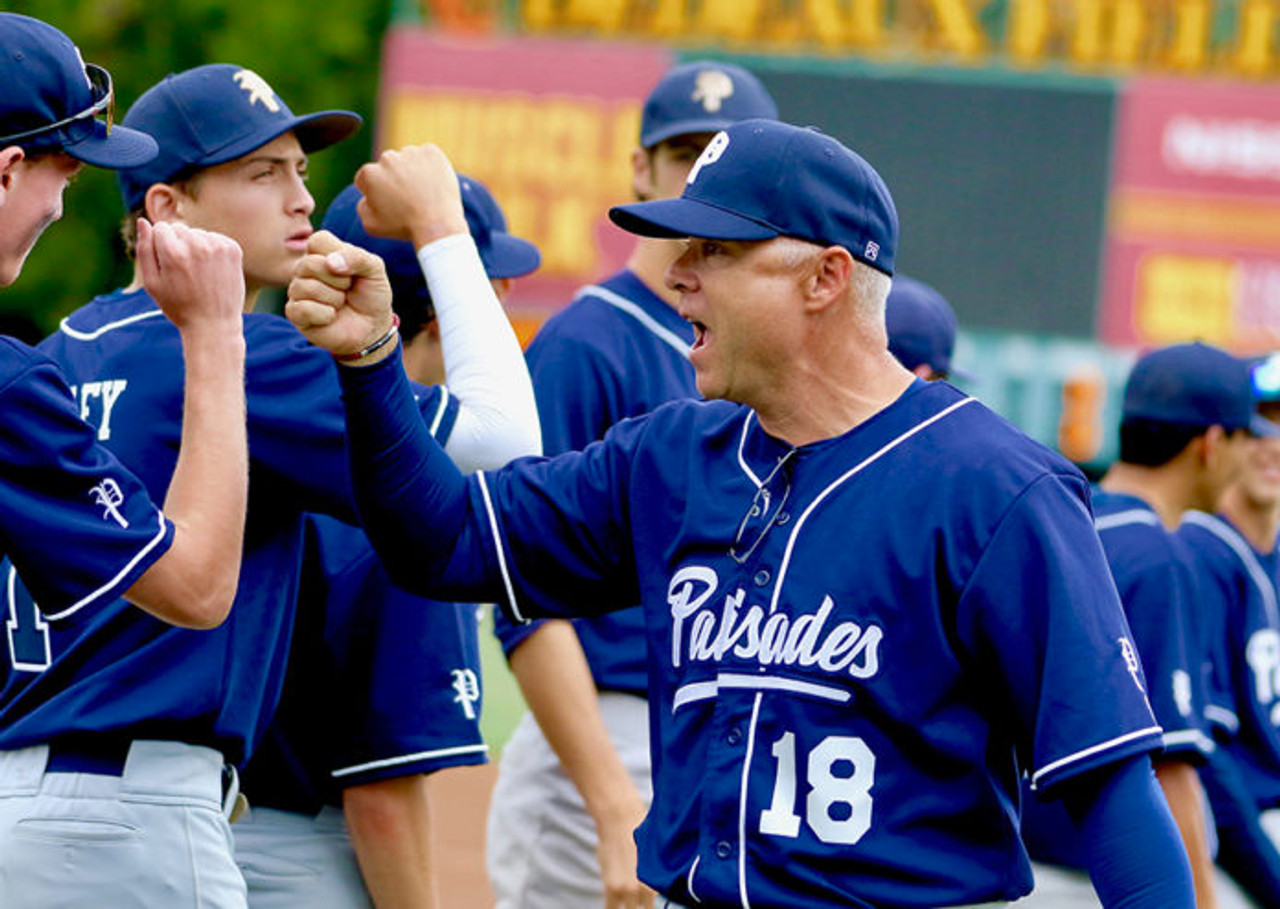 Coach Voelkel and the team after a big win