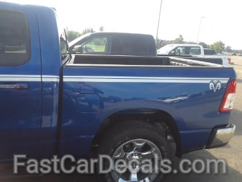 side of blue 2019 Ram 1500 Side Stripes RAM EDGE SIDE KIT 2019-2024