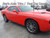 front angle of orange 2023 Dodge Challenger SXT Side  Stripes SXT Side Kit 2011-2026