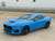 drivers side angle of 2024 Ford Mustang GT Racing Stripes PREMIUM GT RALLY FADED