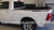 side view of white 4X4 HEMI Dodge Ram 1500 Truck Stripes HUSTLE 2009-2016 2017 2018