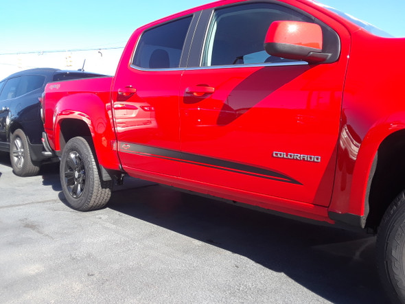 front angle of red 2021 GMC Canyon Extended Cab Stripes RATON 2015-2021