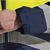 Safety yellow and navy Fleet Jacket from Azulwear South Africa back view close-up highlighting the durable weatherproofing fabric panels, reinforced shoulder seams, and high-visibility strip detailing.