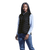 Front profile view of the Black Westfield padded bodywarmer styled on a model, demonstrating the comfortable feminine silhouette and functional utility pockets perfect for team uniform rollouts.