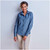 Model wearing the tailored Ladies Long Sleeve Eastwood Denim Shirt featuring front darts, a curved hem, and two V-front button-down pockets, ideal for South African business environments by Azulwear.