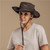 Classic earth-tone Somabula Oilskin Hat by Urban Terrain from Azulwear, displaying the heavy-duty structured 360gsm cotton canvas, water-resistant waxed finish, and adjustable toggle chin strap ideal for rugged outdoor safaris across South Africa.