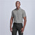 Model wearing the Men's Short Sleeve Nottingham Shirt featuring a button-down collar, back yoke with a box pleat, and curved hem, ideal for South African business settings by Azulwear.