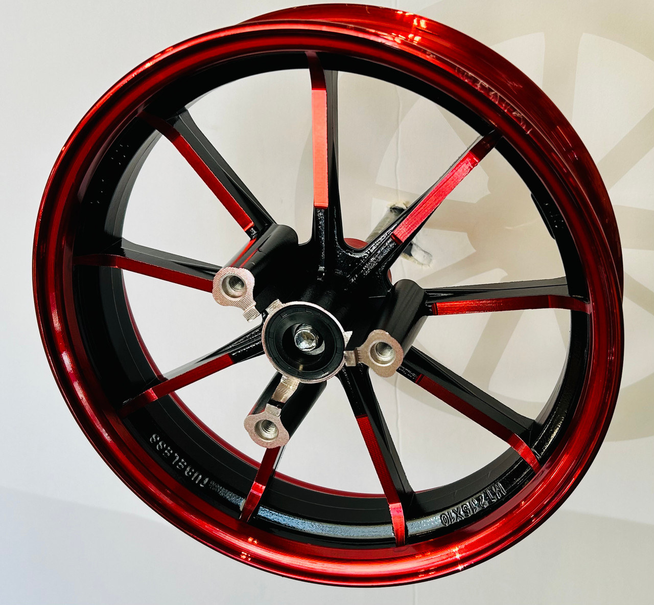 10 Inch mini bike wheel 2.25 inches wide. 12mm bearings red 9 spoke. 