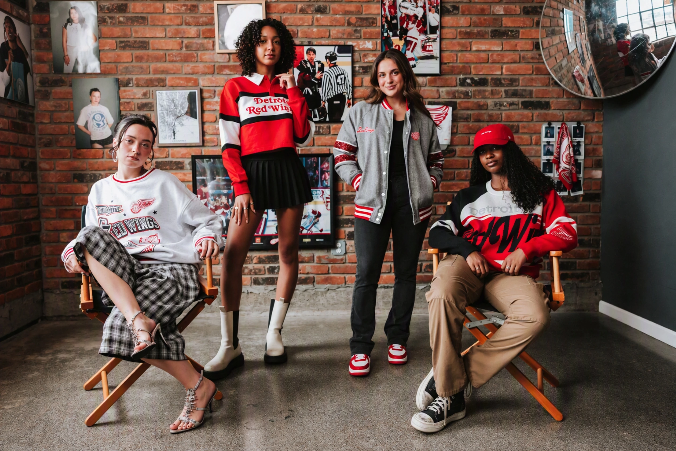 Four females posing and modeling the new Wild Collective apparel for women.  data-size=