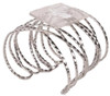 Cuff style corsage bracelet with crossing Silver bands creating diamond pattern