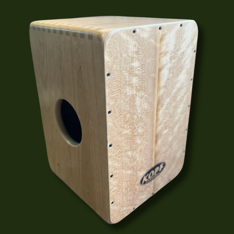Image of the front of the Cherry and Curly Cherry Cajon from Kopf Percussion.