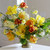 An exclusive collection of tulips, daffodils and hyacinths all in shades of yellow with red highlights.