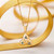 14K Gold Emerald Trinity Knot Pendant