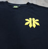 Close-up of the front of the Kapwa Legacy Tee showcasing the raised 3D puff Kapwa Legacy logo. Premium Filipino streetwear T-shirt made from 100% ring-spun cotton with 240 GSM heavyweight pre-shrunk fabric for lasting comfort and durability.