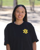 Smiling Filipina woman looking at the camera while wearing the Kapwa Legacy Tee, showcasing the raised 3D puff Kapwa Legacy logo on the front. Premium Filipino streetwear T-shirt made from 100% ring-spun cotton with 240 GSM heavyweight pre-shrunk fabric for everyday comfort, durability, and Filipino pride.