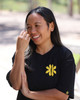 Smiling Filipina woman wearing the Kapwa Legacy Tee, showcasing the raised 3D puff Kapwa Legacy logo on the front. Premium Filipino streetwear T-shirt made from 100% ring-spun cotton with 240 GSM heavyweight pre-shrunk fabric, designed for everyday comfort and Filipino pride.