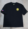 Overhead view of the Kapwa Legacy Tee featuring a raised 3D puff Kapwa logo on the front, woven Kapwa Kultura neck label, size tag inside the collar, custom woven sleeve label on the left sleeve, and embroidered Philippine flag patch on the right sleeve. Premium 100% ring-spun cotton heavyweight Filipino streetwear T-shirt.