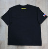 Overhead view of the back of the Kapwa Legacy Tee featuring a raised 3D puff "Kapwa Kultura" logo on the back collar. Premium 100% ring-spun cotton 240 GSM heavyweight Filipino streetwear T-shirt with a clean, minimalist back design and pre-shrunk construction.