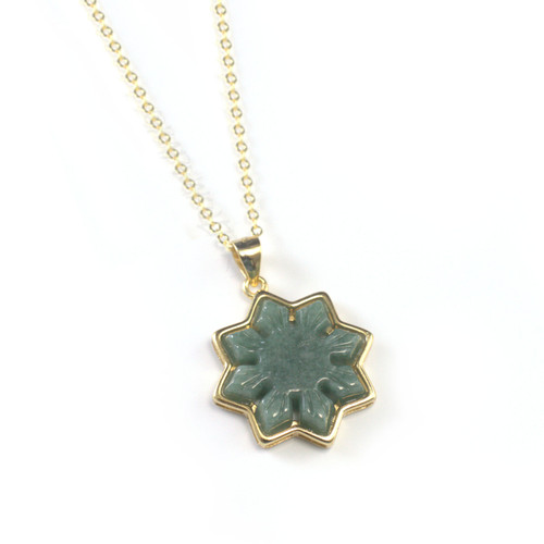 Liwanag jade necklace in a Filipino sun design on a gold-plated sterling silver chain, product photo on a white background